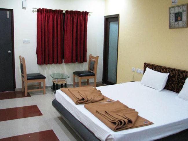 Aum Health Resort Vadodara Rum bild
